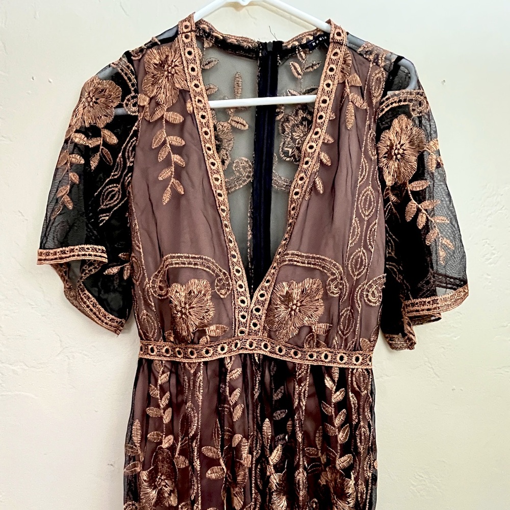 Gold, black maxi dress. Empire waist, deep V neckline. sheer w/ shorts under it.
